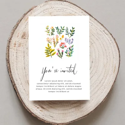 Invitation card with floral illustrations and "You're invited" text.