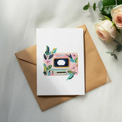 Card with floral cassette tape design on a kraft envelope.