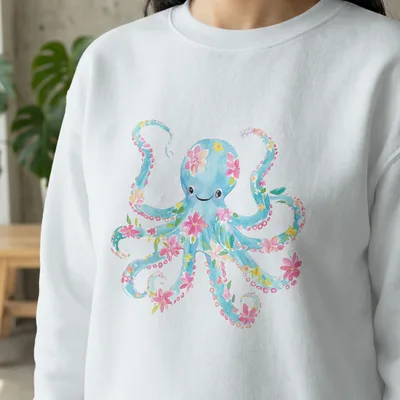 White sweatshirt with blue octopus design and floral accents.