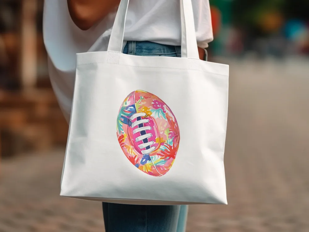 White tote bag with a colorful floral-patterned American football design.