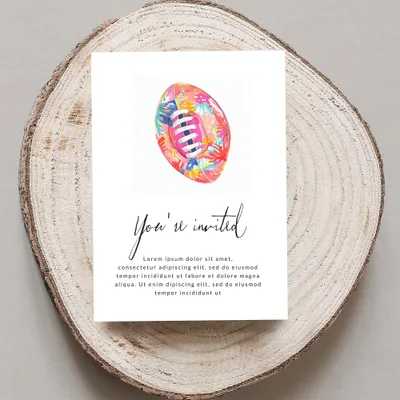 Invitation with floral football design and placeholder text.