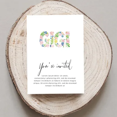 Gigi invitation with floral letters and placeholder text.