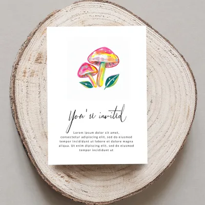 Invitation with watercolor mushrooms and "You're invited" text.