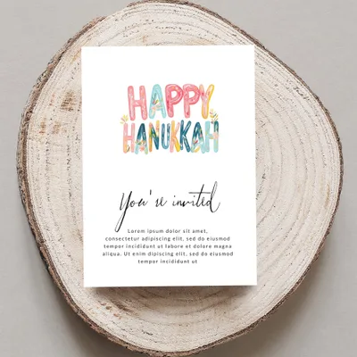 Invitation with "Happy Hanukkah" text and placeholder invitation details.