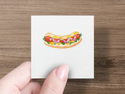 Hot dog with mustard, ketchup, and relish on a bun.