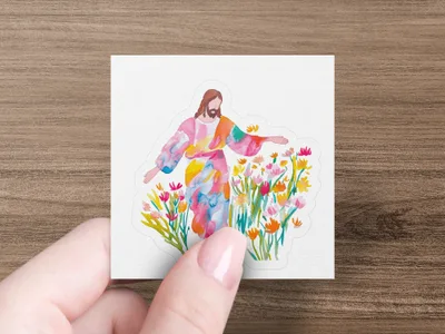 Jesus with outstretched arms surrounded by colorful flowers.