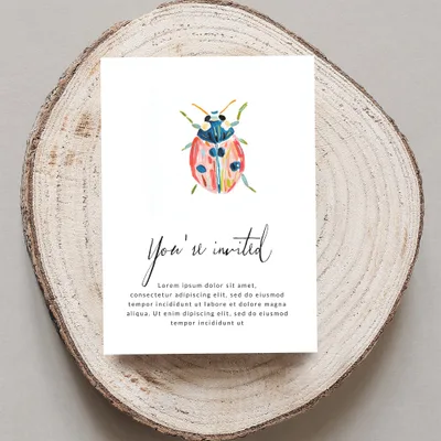 Card with watercolor ladybug and "You're invited" text.