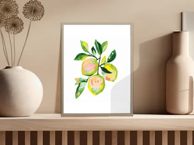 Watercolor painting of yellow and pink fruit with green leaves in a frame.