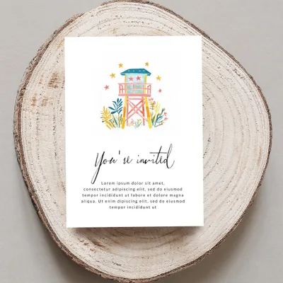 Invitation card with "You're invited" text and a watercolor lifeguard tower.