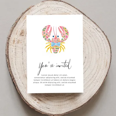 Lobster invitation with "You're invited" text and floral pattern.