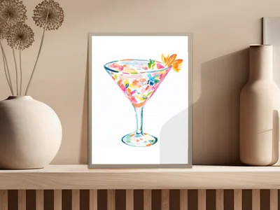 Colorful cocktail glass with abstract floral pattern, displayed on a shelf.