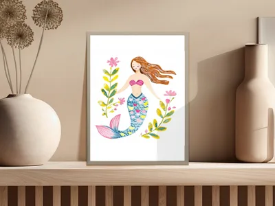 Illustration of a mermaid with flowing red hair, pink tail, and floral accents.