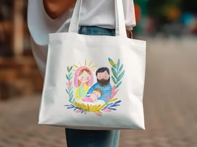 Nativity scene illustration of Mary, Joseph, and baby Jesus on a white tote bag.