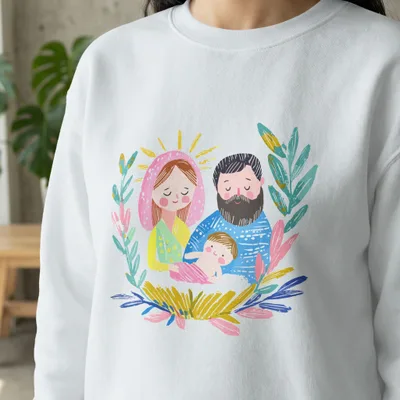 Crewneck sweatshirt with a colorful Nativity scene illustration.