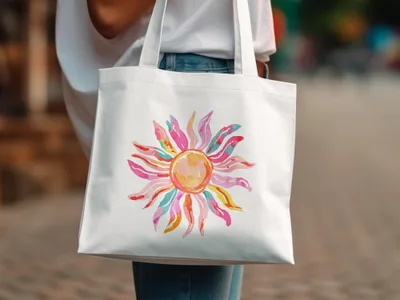 White canvas tote bag with a watercolor sunburst design in vibrant colors.