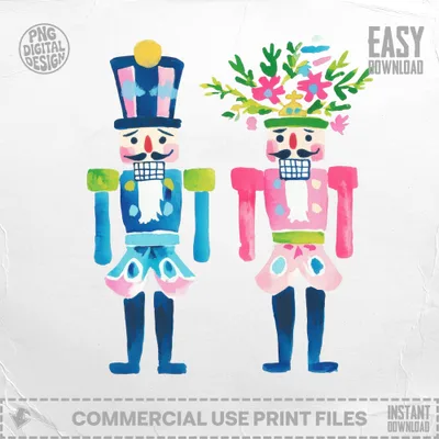 Two decorative nutcracker figures, one blue and one pink, with floral headdresses.