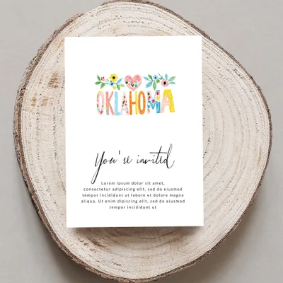 Oklahoma invitation with floral accents and placeholder text.