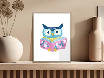 Whimsical blue owl reading a book with pink flowers on a shelf.