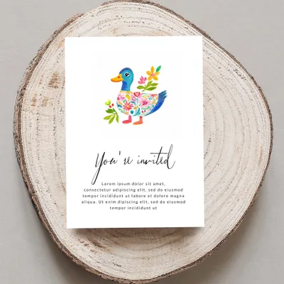 Watercolor duck with floral accents on a "You're invited" card.