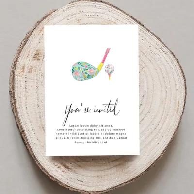 Golf invitation with floral golf club and ball design.