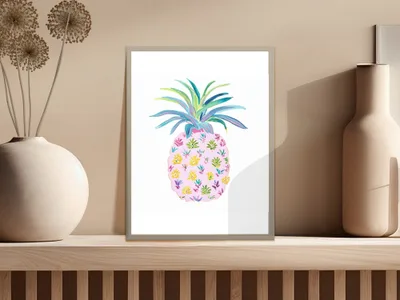 Pink pineapple artwork with colorful floral pattern on a shelf.