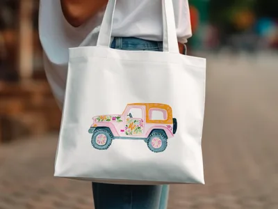 White tote bag with a watercolor illustration of a pink and orange jeep with flowers.