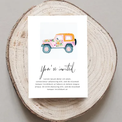 Invitation card with a pink Jeep and floral design.
