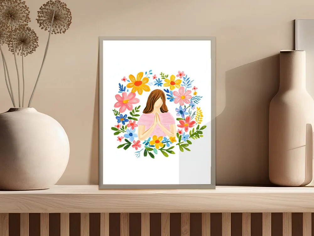 Woman praying surrounded by a colorful floral wreath on a shelf.