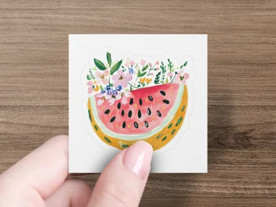 Watercolor slice of watermelon with a floral bouquet on a white background.