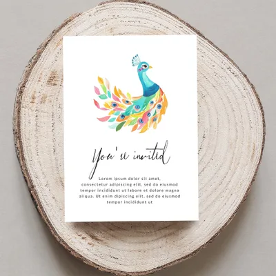 Invitation with watercolor peacock and placeholder text.