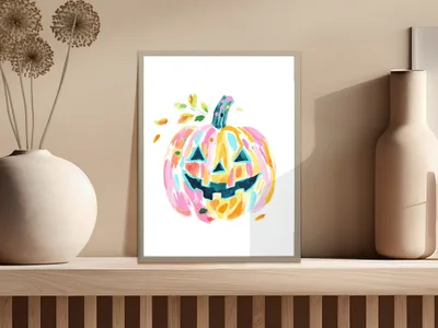 Watercolor pumpkin with colorful abstract brushstrokes and leaves.