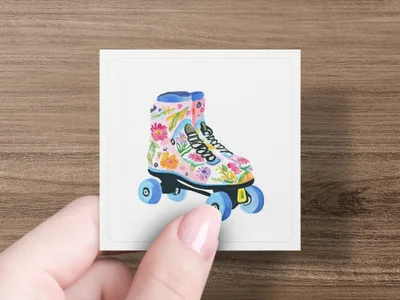 Watercolor roller skate with floral pattern, held by a hand.