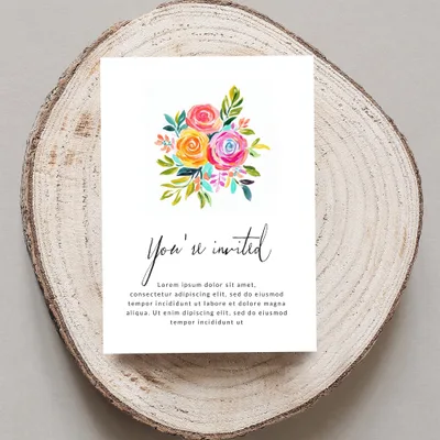 Invitation with watercolor flowers and placeholder text.