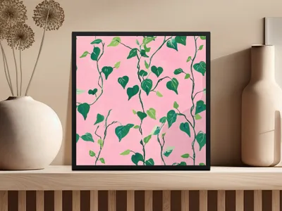Green vine leaves with pink background in a square frame.