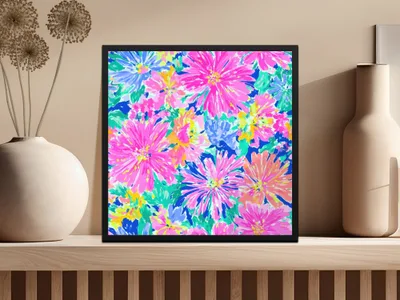 Colorful floral print artwork in a black frame.