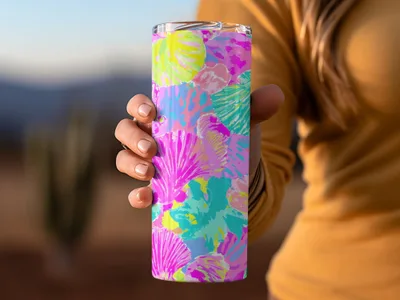 Tumbler with a colorful seashell pattern.