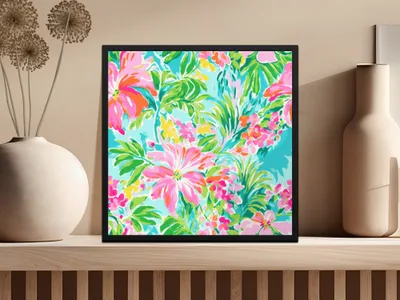 Framed artwork with vibrant pink and green floral pattern on a light blue background.