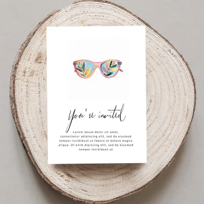 Invitation with colorful sunglasses and cursive "You're invited" text.