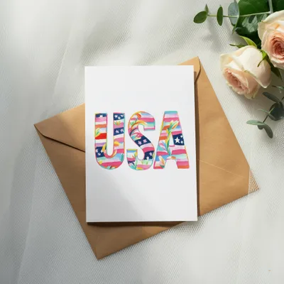 Card with colorful USA lettering on a brown envelope.