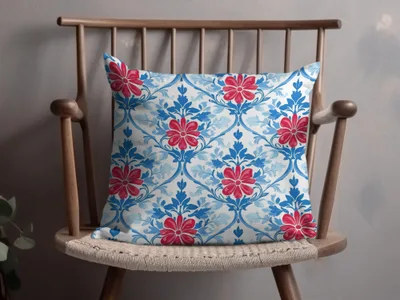Decorative throw pillow with a blue and red floral damask pattern.