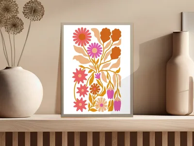 Framed artwork featuring abstract floral illustrations in orange, pink, and yellow.