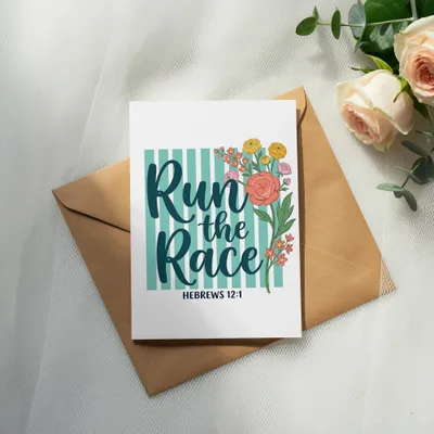 Greeting card with "Run the Race" and floral design, on an envelope.