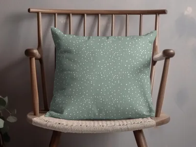 Decorative Green Pillow with Small White Triangle Pattern