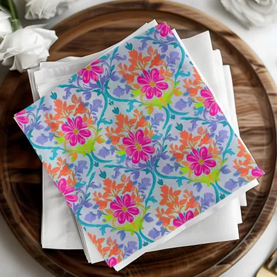 Fabric with colorful floral pattern on white napkins and wooden tray.