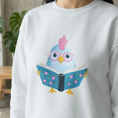 White sweatshirt with a cartoon blue bird wearing glasses reading a book.