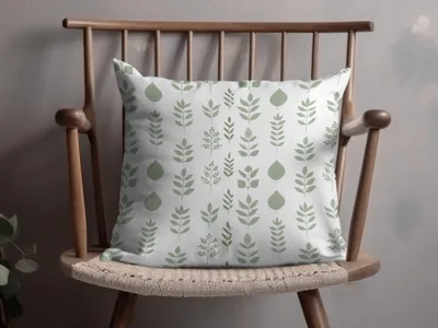 Elegant Decorative Cushion with Green Leaf Print Design