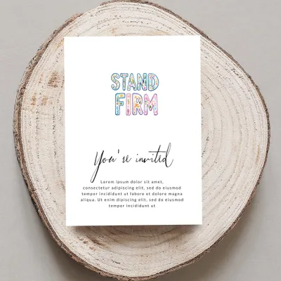 "Stand Firm" invitation with placeholder text on wood slice.