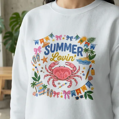 White sweatshirt with "Summer Lovin'" text and a large crab illustration surrounded by beach icons.