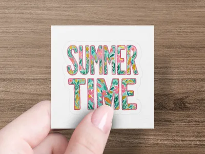 "SUMMER TIME" text with floral patterns, held by a person's hand.