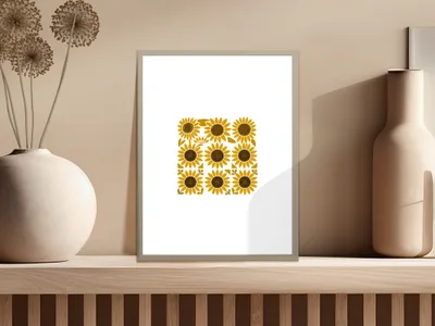 Framed artwork of a nine-square grid with yellow sunflowers.